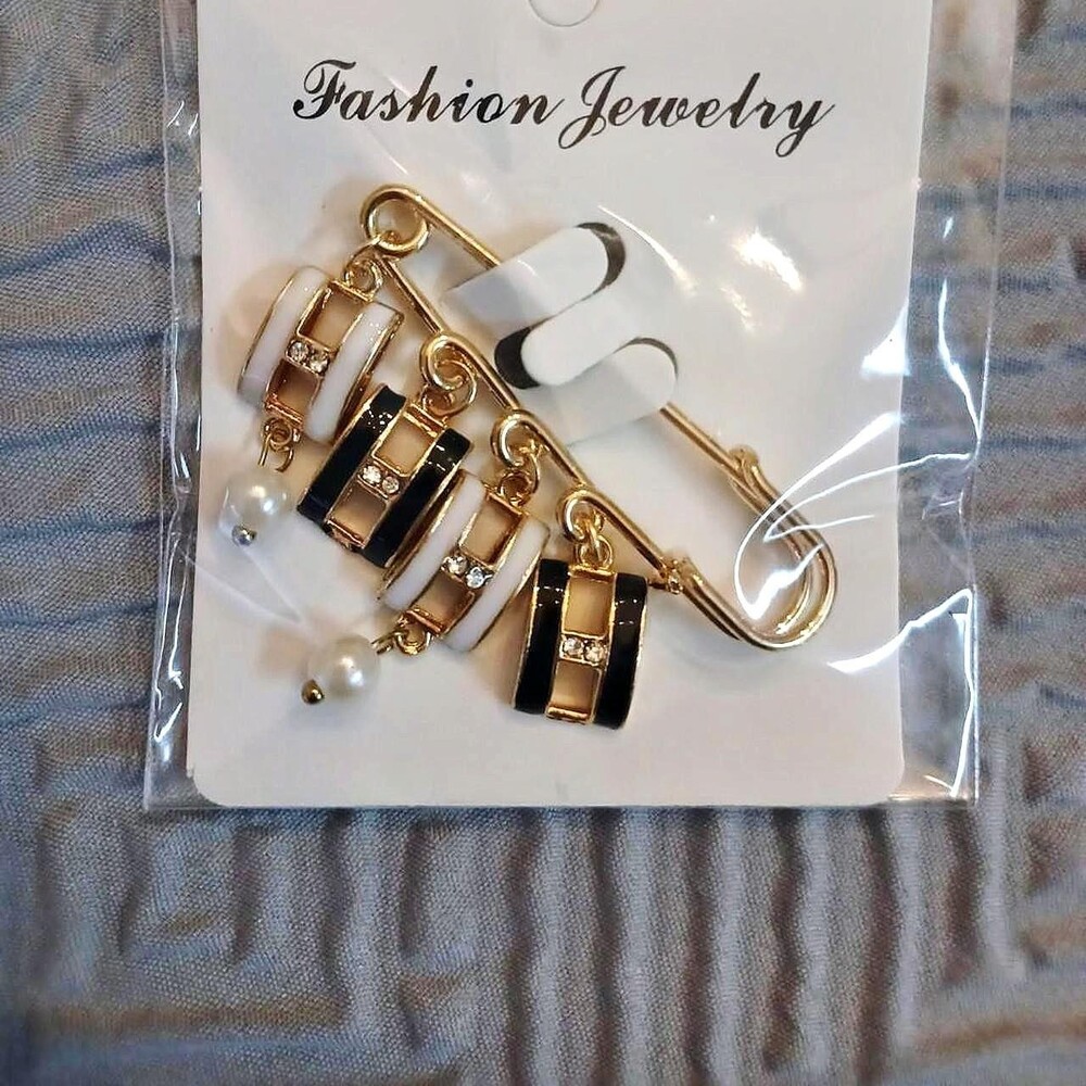 Black & white pearl earrings with gold accents #pearl #statement
